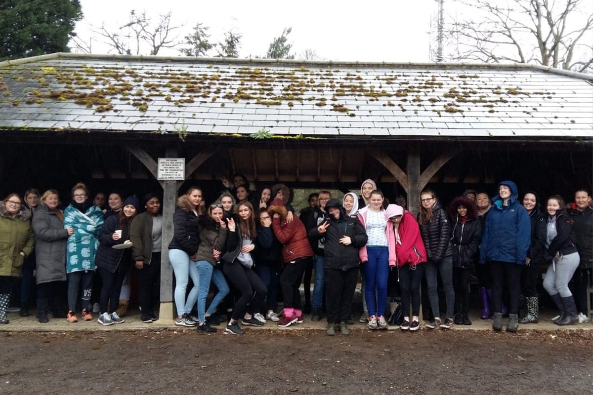 Students brave the weather to give something back